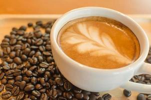 Latte and coffee beans photo