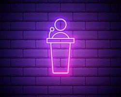 Glowing neon Speaker icon isolated on brick wall background. Orator speaking from tribune. Public speech. Person on podium. Vector Illustration