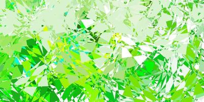 Light green, yellow vector background with polygonal forms.