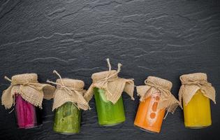 Jar of preserved veggies and fruit photo