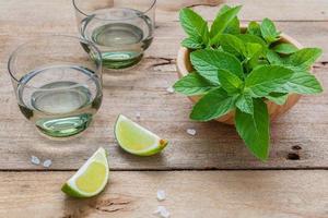 Glasses with lime and mint photo