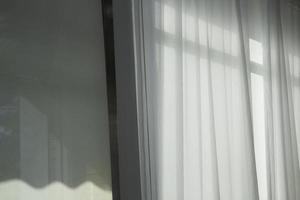 Soft curtain in modern white room photo
