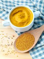 Mustard and mustard seeds photo