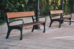 Wooden benches on the street photo