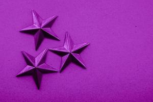 Purple star decoration textured background photo