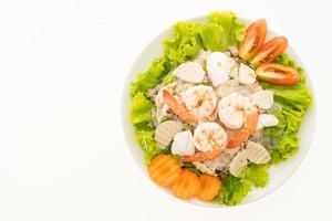 Spicy seafood noodles salad, Thai style photo