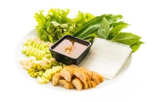 Vietnamese Pork Sausage and salad on a white plate photo