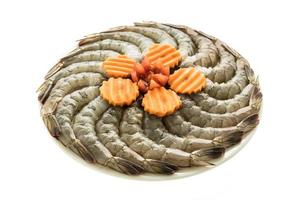 Raw prawn and shrimp on plate photo