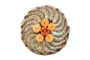 Raw prawn and shrimp on plate photo