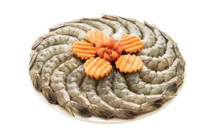 Raw prawn and shrimp on plate photo