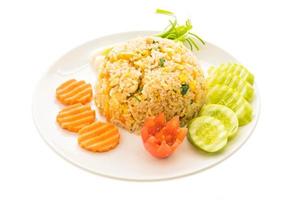 Fried rice with crab meat on white plate photo