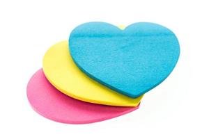 Paper hearts on white background photo