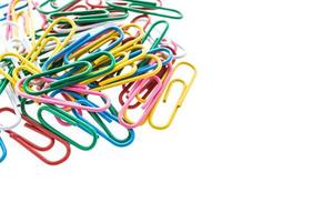 Paper clips on white background photo