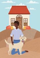 afro young man with cute dog outdoors
