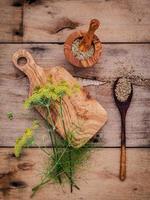 Top view of fresh fennel and fennel seeds photo