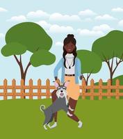 joven mujer afro con lindo perro en el campo vector