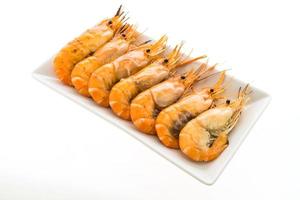 Grilled Prawn and shrimp on white plate photo