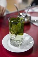 Coca tea on the table in Peru photo