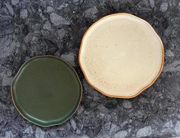 Top view of empty ceramic plates photo