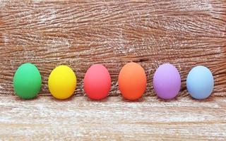 Easter eggs on a wooden background photo