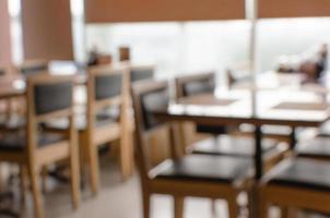 Blurred chairs and tables background photo