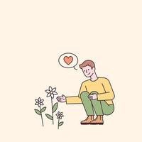 A man is sitting and looking at a flower blooming vector