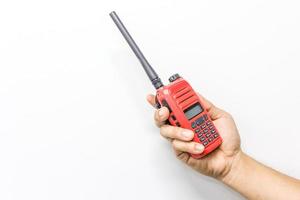 Red walkie talkie handheld, isolated on a white background with copy space and text photo