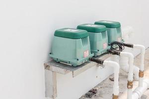 Linear septic air pump aerator for toilet room in a new factory building photo