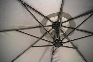 Grey outdoor umbrella photo