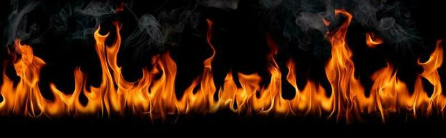 Fire flames isolated on a black background photo
