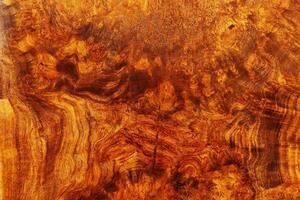 Fondo de textura de madera rayada afzelia burl foto