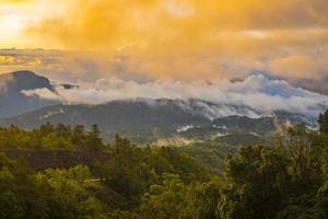 Sunset above mountains photo