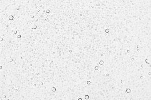 Raindrops on a glass background photo