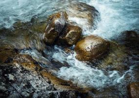 Waves on rocks photo