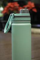 Thermos bottle for hot and cold drink photo