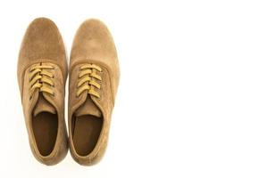 Brown leather shoes on white background photo