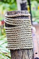 Rope on a wooden surface photo