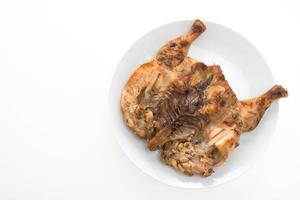 Grilled chicken on white plate photo