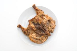 Grilled chicken on white plate photo