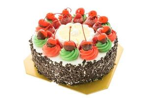 Ice cream cake with Christmas theme and cherry on top photo