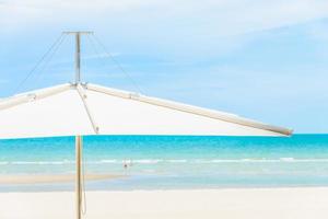 Umbrella on the tropical beach photo