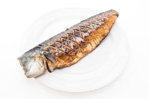 Grilled saba fish on white plate photo