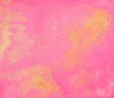 Pink and gold paint texture photo