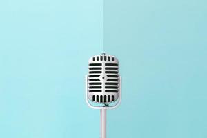 Retro microphone on a blue background photo