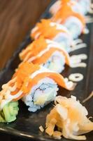 Salmon sushi roll, traditional Japanese food photo