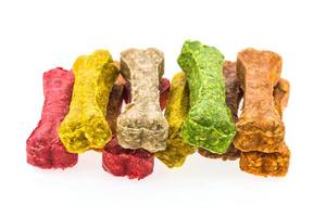 comida colorida de huesos de perro foto