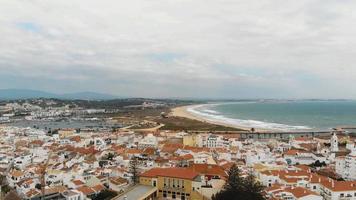 Aerial 4k footage of  the seaside town of Lagos, Portugal with it's superb beaches within walking distance and offering a lively nightlife. video