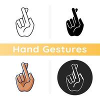 Crossed fingers icon vector