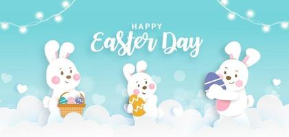 Easter day banner with  cute rabbiits and easter eggs in paper cut style. vector