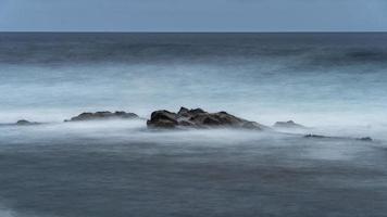 Wild water on rocks in Gran Canaria photo